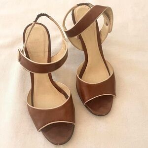brown and tan sling back heels with peep toes
